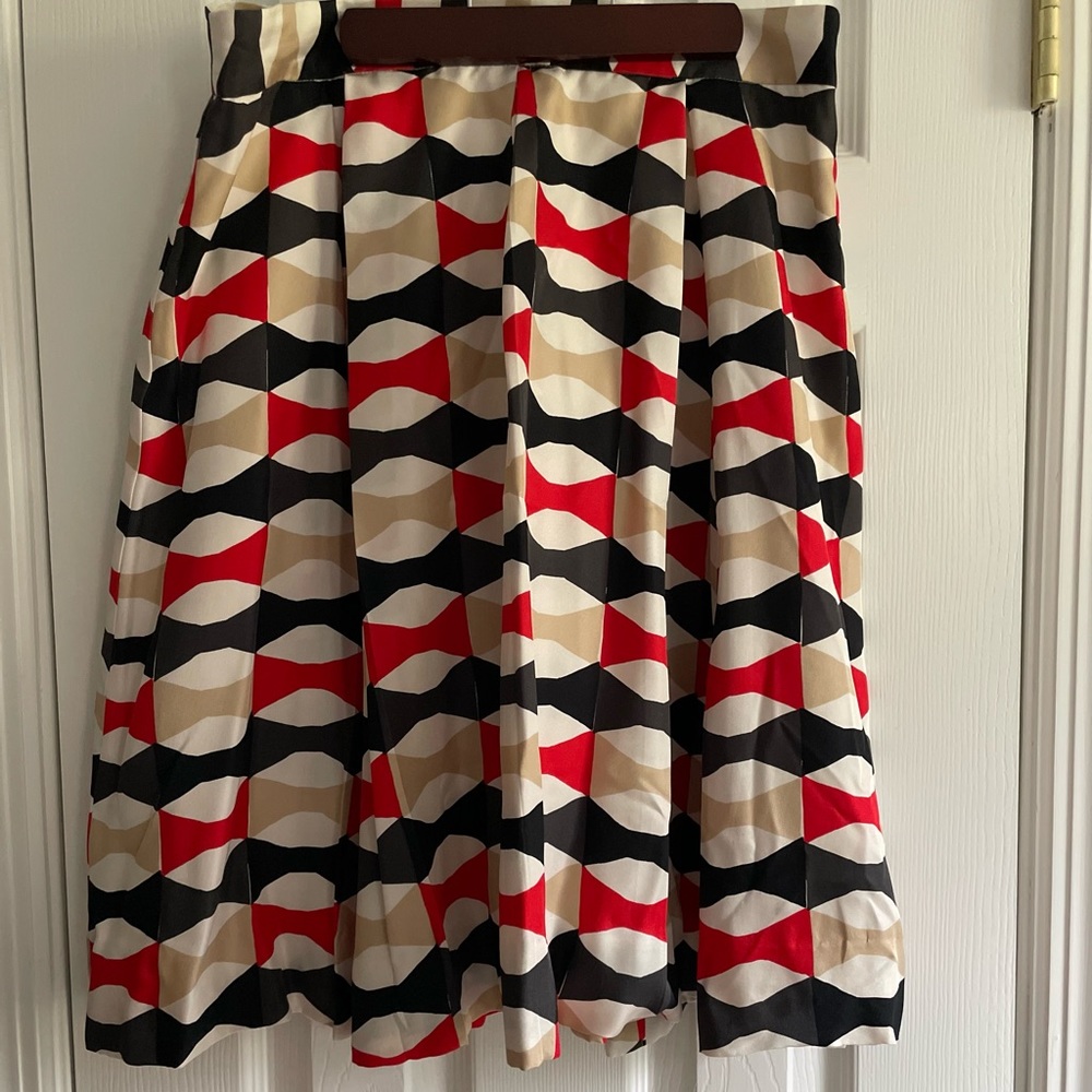 KATE SPADE pleated a-line skirt with bow tie pattern, size 10